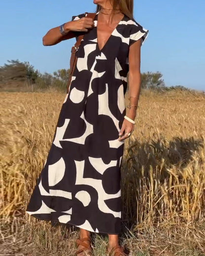 Amaria - Maxikleid mit Print und V-Ausschnitt