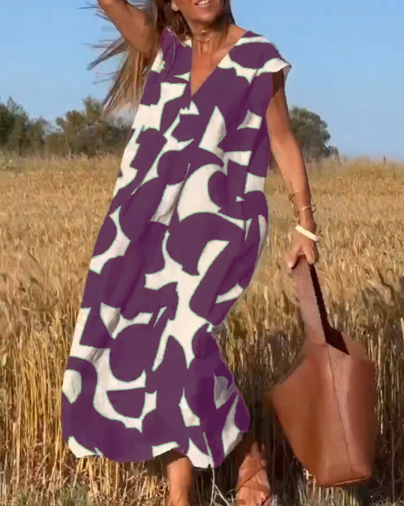 Amaria - Maxikleid mit Print und V-Ausschnitt