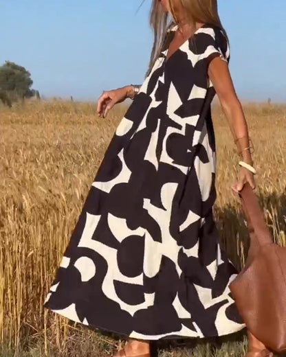 Amaria - Maxikleid mit Print und V-Ausschnitt