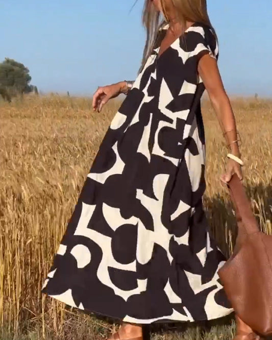 Amaria - Maxikleid mit Print und V-Ausschnitt